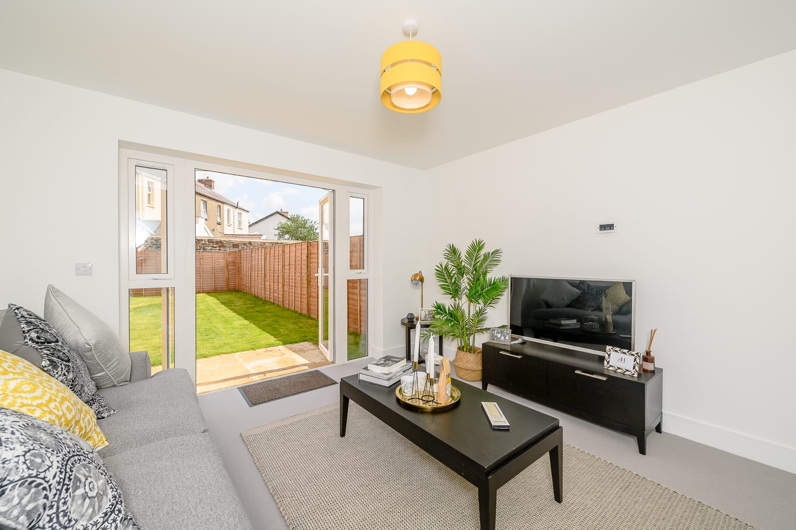 The Shipton lounge by Newland Homes at a sister development. Please note specification will vary from site to site. Please confirm with Sales Consultant.