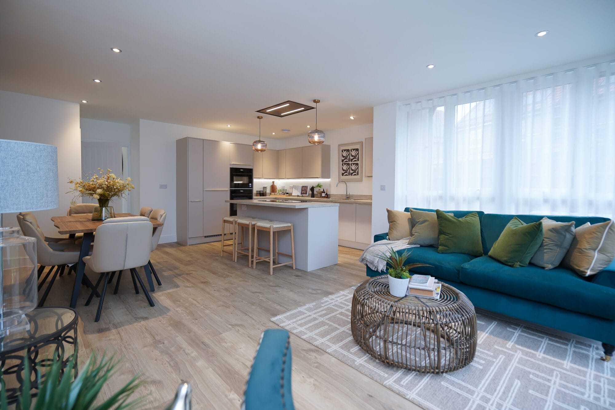 The Hampton kitchen / sun lounge by Newland Homes at a sister development. Please note specification will vary from site to site. Please confirm with Sales Consultant.