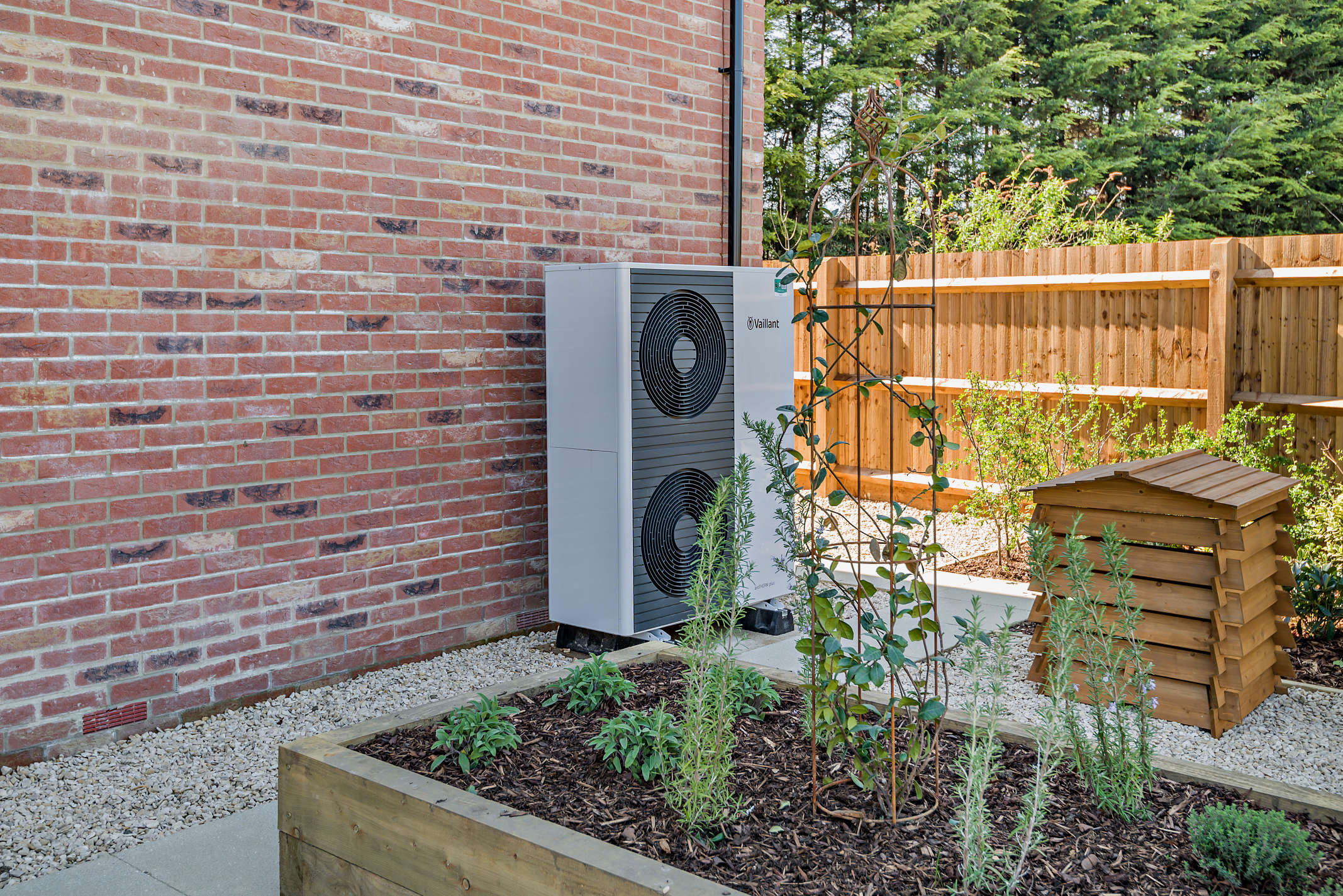 Air source heat pump creating heat and hot water throughout zero carbon homes